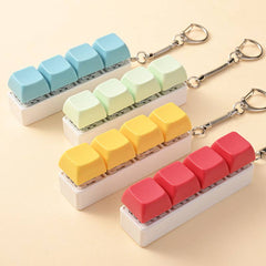 Porte-clés touches de clavier pastel anti stress